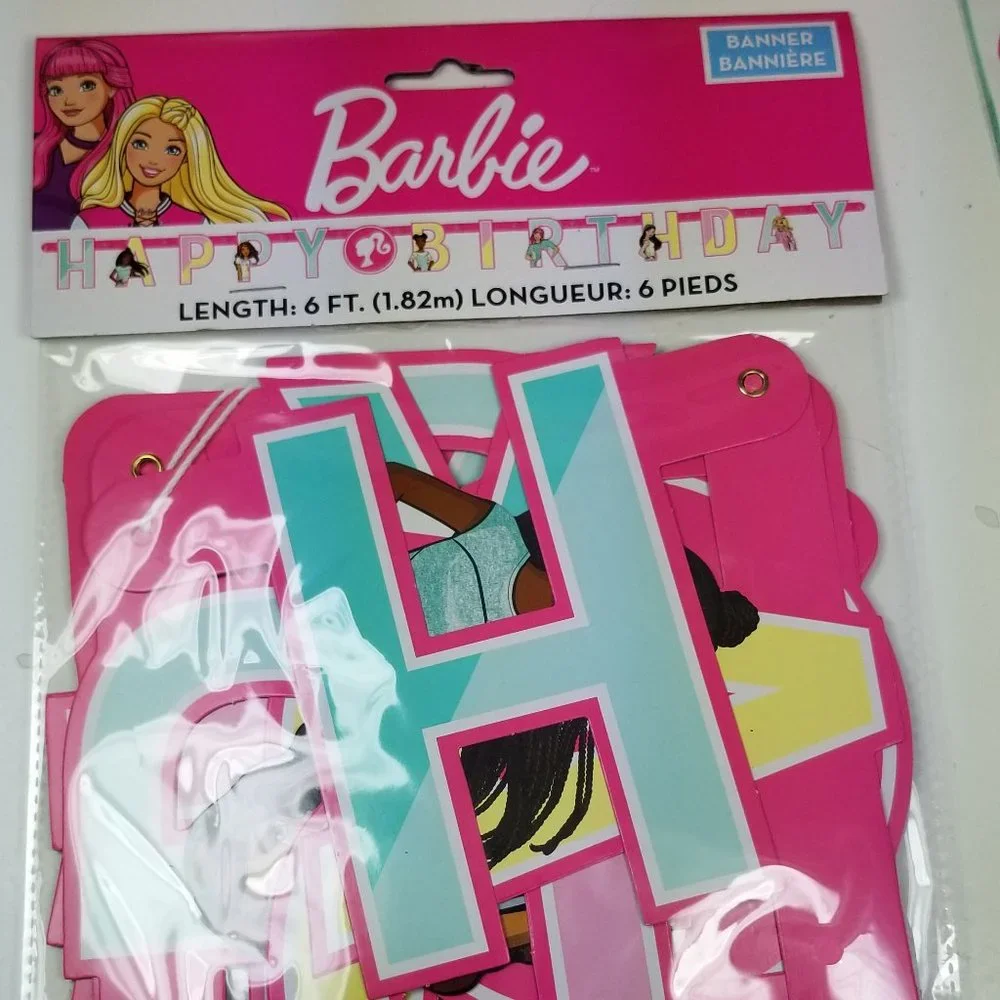 Barbie party set for 16 includes small and large plates, banner and goodie bags